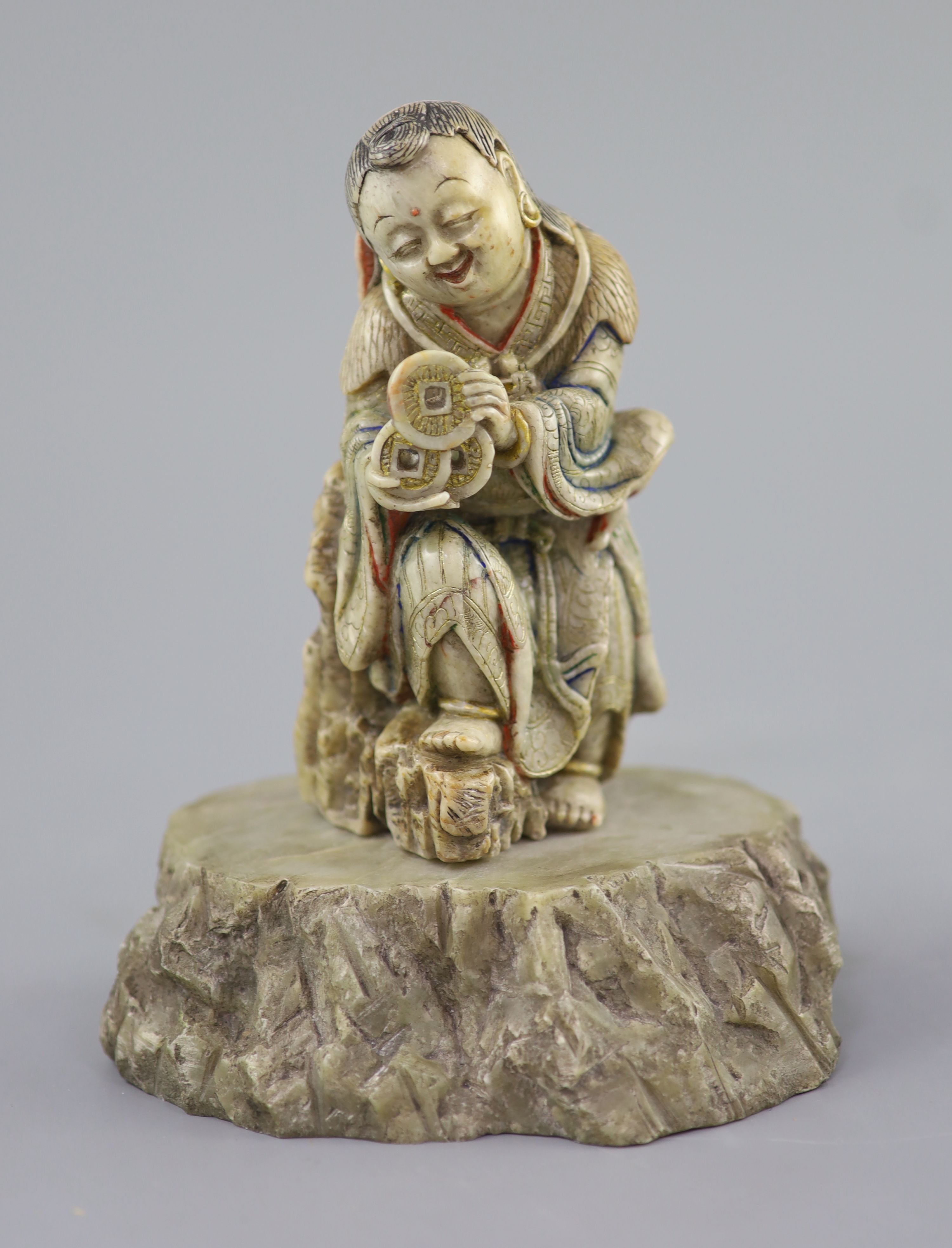 A Chinese soapstone figure of Liu Hai, probably Kangxi period, 16.5cm high